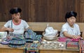 Red Yao women selling products to tourists. Red Yao women of Huangluo are known for the Ã¢â¬ÅworldÃ¢â¬â¢s longest hair villageÃ¢â¬Â.